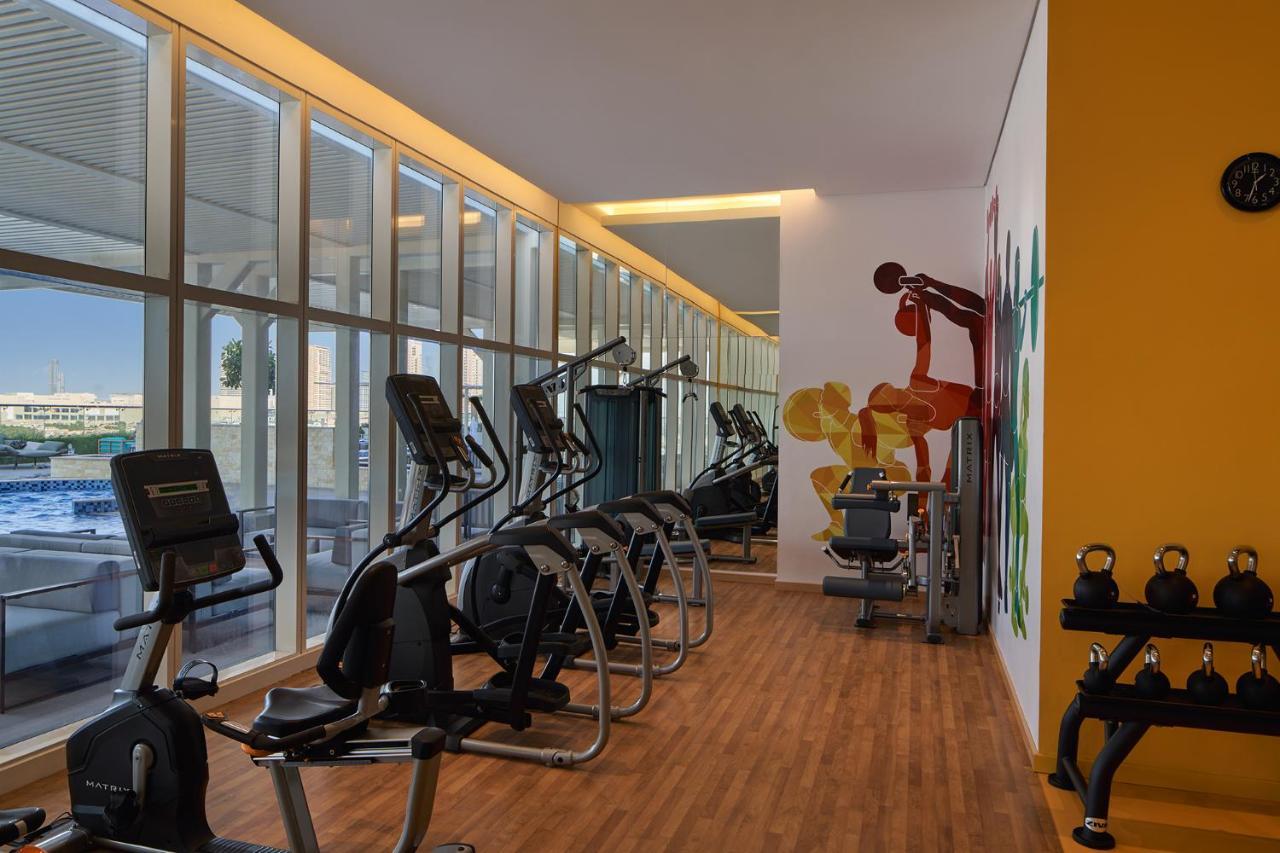 Movenpick Jumeirah Village Triangle Дубай Екстер'єр фото The gym at the hotel