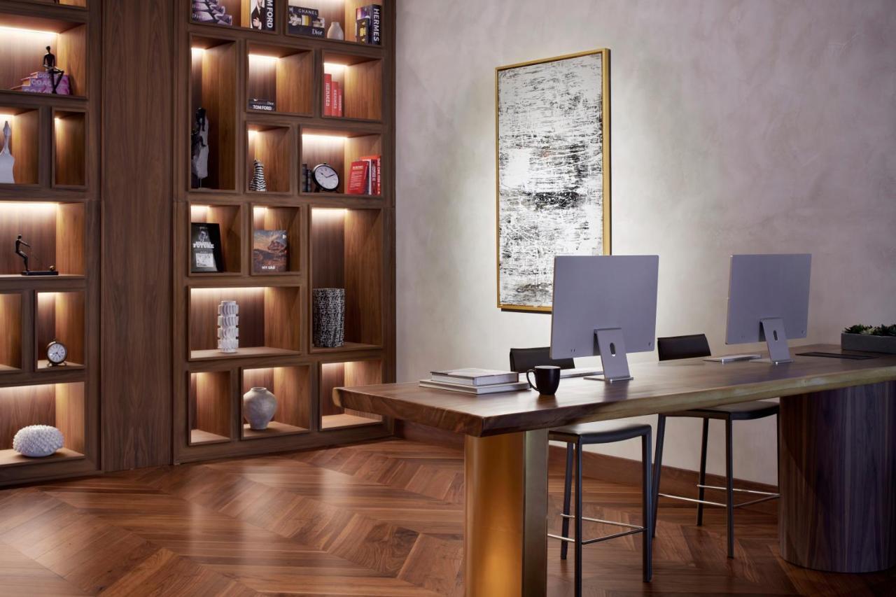 Movenpick Jumeirah Village Triangle Дубай Екстер'єр фото The library at the hotel