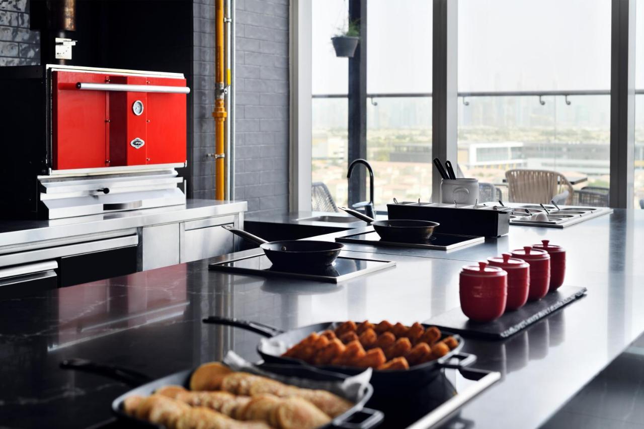 Movenpick Jumeirah Village Triangle Дубай Екстер'єр фото A commercial kitchen